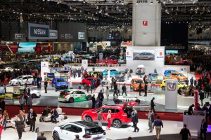 Geneva, Switzerland - March 1, 2016: People and cars at the 86th International Geneva Motor Show in Palexpo, Geneva.